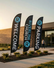 Load image into Gallery viewer, Custom church feather flags — Welcome, Riverline Church, and Parking flags at a building entrance