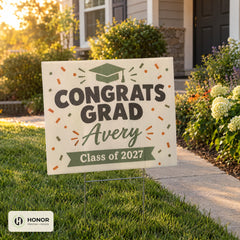 Graduation yard sign in a front lawn