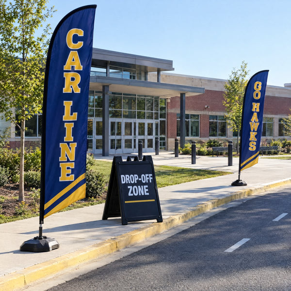 School feather flags at a campus entrance