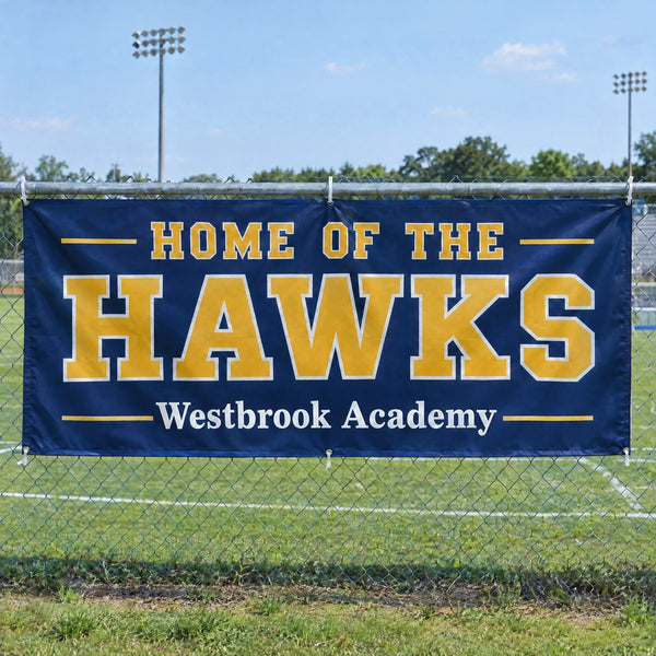 School fence banner at an athletic field
