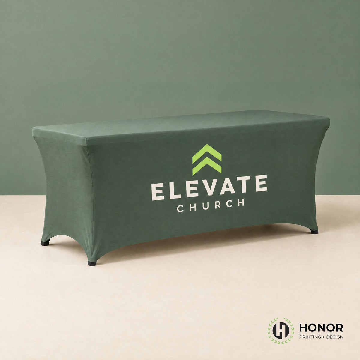 Green stretch table cover printed with a white logo